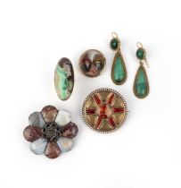 A group of hardstone jewels, 19th century, comprising: two Scottish hardstone brooches, composed