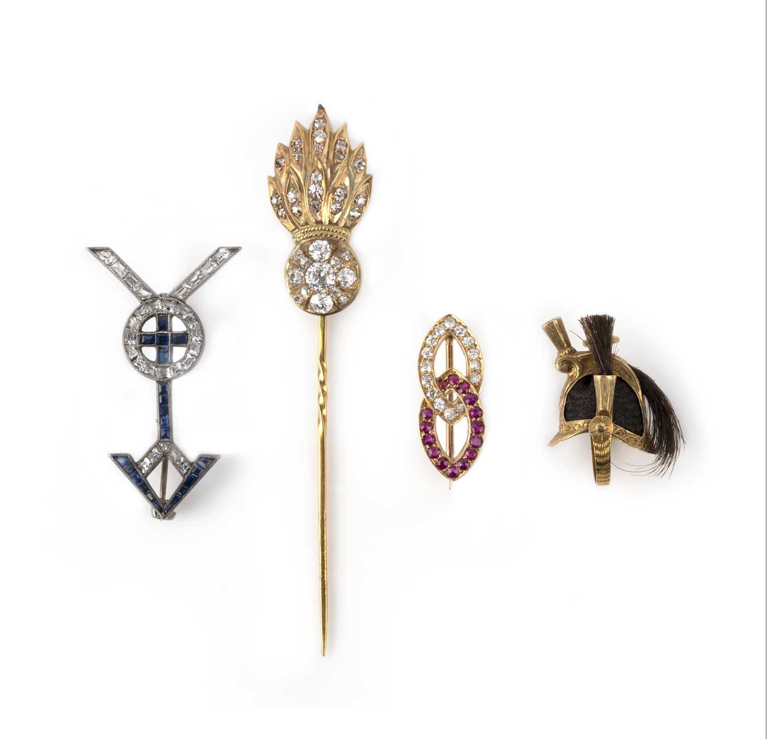 A collection of three brooches and a hairwork charm, late 19th/early 20th century, comprising: a