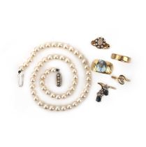 A group of five gold and gem-set rings and a cultured pearl necklace, comprising: an opal and seed
