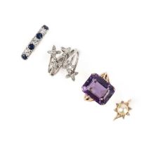 A collection of four rings, comprising: an amethyst ring, mounted in gold, size O1/2; a sapphire and