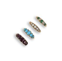 A collection of four rings, each of five-stone design, set with oval garnets and rose-cut