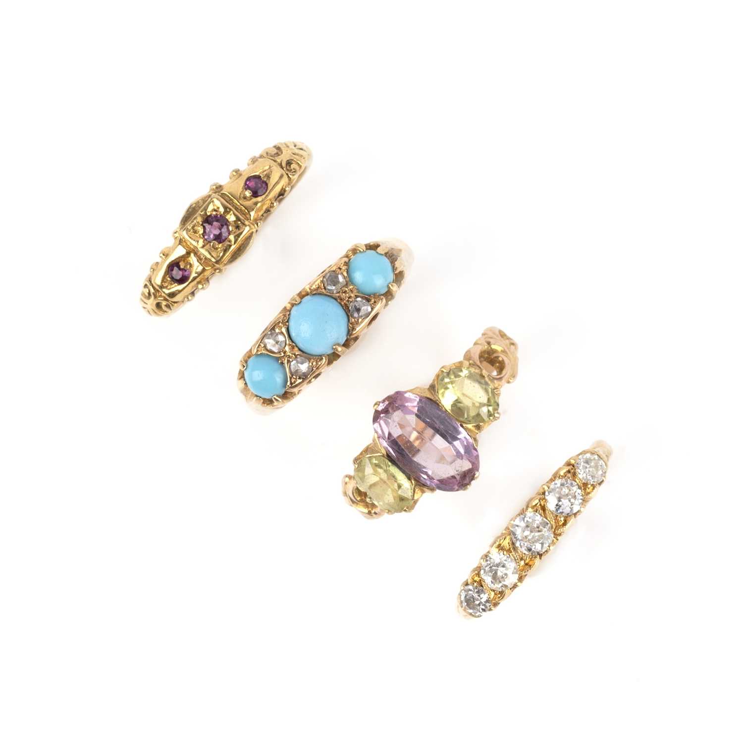 A collection of four gold and gem-set rings, 19th century, comprising: a pink topaz and