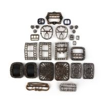 A collection of shoe buckles and a set of buttons, 18th/19th century, comprising: one pair of