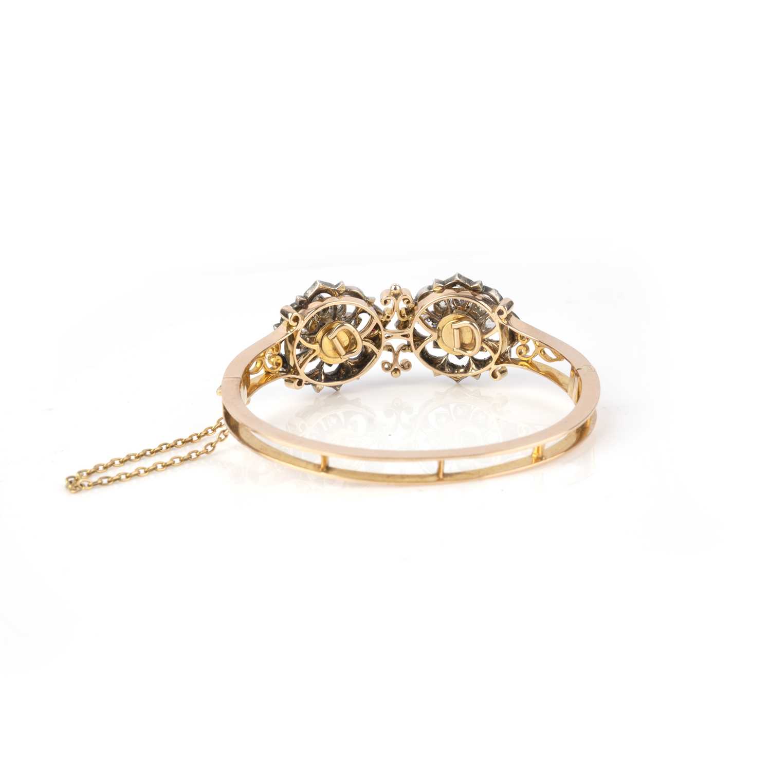 An unusual convertible diamond bangle/pair of brooches, late 19th century, the hinged gold bangle of - Image 2 of 3