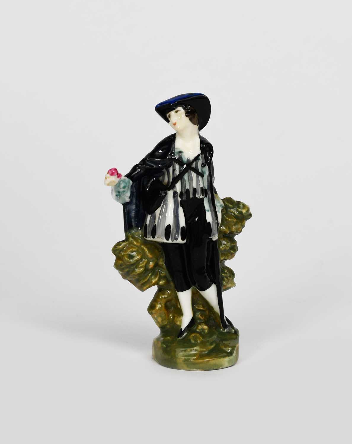 'Shepherd' M17 a rare Royal Doulton miniature figure, modelled standing in black cape, hat and