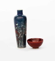 A Ruskin Pottery vase by William Howson Taylor, dated 1910, shouldered form with cylindrical neck,