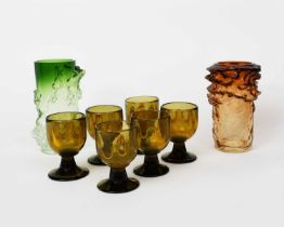 Karlin Rushbrooke (born 1944) six goblets, 1974 green glass with yellow trail decoration, and two