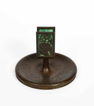 A Tiffany Studios patinated bronze and Favrile glass 'Grape' match-holder, model no.28479,