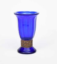 A Moser Oroplastika glass vase, footed, flaring faceted blue glass, with acid etched band of soldier