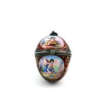 A late 19th century Austrian silver and enamel egg, maker's mark SC, Vienna, circa 1890, decorated