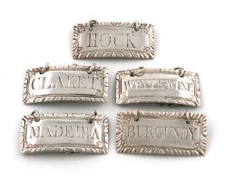 A set of five George III silver wine labels, possibly by John Rich, London circa 1770, rectangular