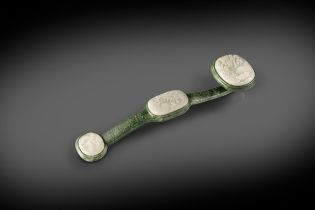 A CHINESE WHITE AND SPINACH-GREEN JADE RUYI SCEPTRE 18TH CENTURY The mottled dark green sceptre