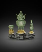 A SET OF THREE FINE CHINESE SPINACH-GREEN JADE ALTAR VESSELS QIANLONG 1736-95 Comprising: a tall