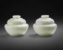 AN EXCEPTIONAL PAIR OF FINE CHINESE IMPERIAL WHITE JADE JARS AND COVERS QIANLONG 1736-95 Each with a