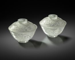 A PAIR OF CHINESE WHITE JADEITE 'BAJIXIANG' BOWLS AND COVERS 19TH CENTURY The U-shaped vessels
