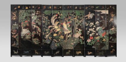 A CHINESE TEN-PANEL COROMANDEL LACQUER ‘BAINIAO CHAOFENG’ SCREEN KANGXI 1662-1722 Finely carved