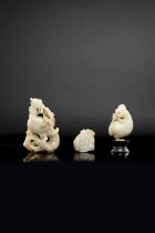 A CHINESE PALE CELADON JADE COCKEREL QIANLONG 1736-95 The translucent stone is finely carved with