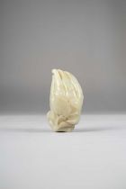 A CHINESE PALE CELADON JADE CARVING OF A FINGER CITRON QING DYNASTY OR LATER The fruit