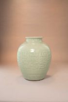 A LARGE CHINESE MOULDED CELADON-GLAZED ARCHAISTIC OVOID VASE SIX CHARACTER QIANLONG SEAL MARK AND OF