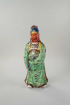 AN UNUSUAL CHINESE POLYCHROME-ENAMELLED DEHUA FIGURE OF GUANDI THE PORCELAIN 17TH/18TH CENTURY,