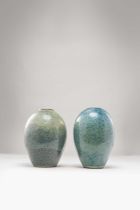 TWO CHINESE YIXING ROBIN'S EGG GLAZED OVOID VASES QING DYNASTY Each coated with a thick speckled-