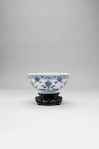 A CHINESE BLUE AND WHITE 'LOTUS' BOWL KANGXI 1662-1722 Painted around the exterior with a formal