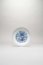 A CHINESE BLUE AND WHITE 'DRAGON' DISH SIX CHARACTER JIAQING MARK AND OF THE PERIOD 1796-1820 The