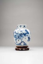 A CHINESE BLUE AND WHITE JAR AND COVER KANGXI 1662-1722 The ovoid body painted with an Immortal on a