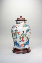 A CHINESE WUCAI BALUSTER VASE TRANSITIONAL C.1650 Painted with ladies and boys playing in a fenced