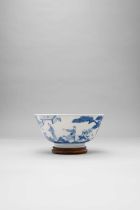 A CHINESE BLUE AND WHITE BOWL SIX-CHARACTER KANGXI MARK AND OF THE PERIOD 1662-1722 Of flaring form,