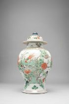 A CHINESE FAMILLE VERTE BALUSTER VASE KANGXI 1662-1722 Painted with a long tailed bird on rockwork