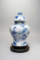 A CHINESE BLUE AND WHITE 'LADIES' BALUSTER VASE AND COVER KANGXI 1662-1722 Painted with ladies