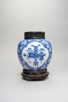A CHINESE BLUE AND WHITE 'HUNDRED ANTIQUES' JAR KANGXI 1662-1722 Decorated with three quatrefoil