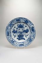 A LARGE JAPANESE BLUE AND WHITE KRAAK-STYLE DISH EDO PERIOD, C.1700 The well painted with a large