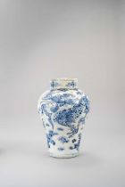 A TALL KOREAN BLUE AND WHITE 'DRAGON' VASE JOSEON DYNASTY, 19TH CENTURY The tall baluster-shaped