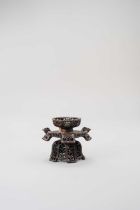 A CHINESE HARDWOOD RETICULATED STAND QING DYNASTY Formed as a flowerhead, with lappet-like petals on