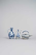 THREE JAPANESE BLUE AND WHITE POURING VESSELS EDO PERIOD, 17TH CENTURY The first a tea kettle of