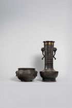 A LARGE JAPANESE BRONZE ARCHAISTIC VASE AND A JARDINIERE MEIJI ERA, 19TH/20TH CENTURY The tall