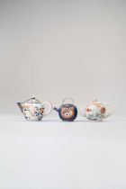 THREE JAPANESE MOULDED TEAPOTS AND COVERS EDO PERIOD, 17TH/18TH CENTURY The smallest decorated