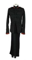 A British Army dress uniform for a Captain of a rifle regiment, dark green jacket green cord lace,