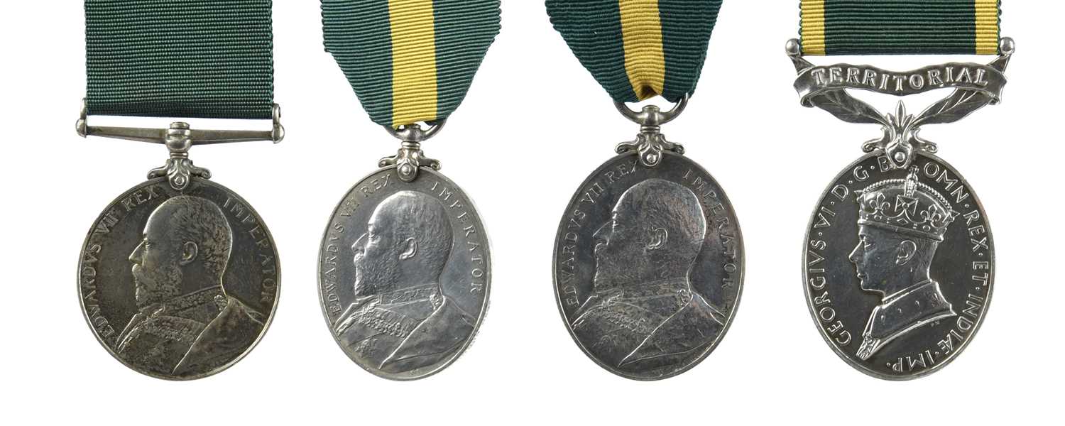 London Irish Rifles and associated units: a small collection of long service awards, comprising: