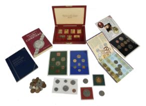 A quantity of coins and other numismatic items, including: a small number of 18th and 19th-century