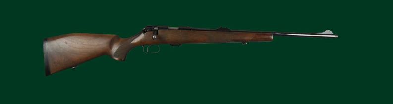 Ƒ Mauser: a .22LR Model 201 bolt action sporting rifle, serial number 130854, barrel 21.5 in.,