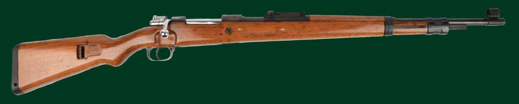 Ƒ Fabrique Nationale: a .30-06 composite bolt-action rifle built on an FN Mauser action, serial