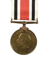 A Special Constabulary Long Service Medal, George V (E. R. HIGGINBOTHAM.), in box of issue,