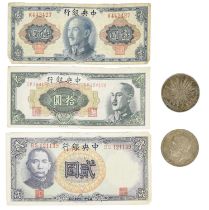 A quantity of international currency, including: United Kingdom: George V, crown, 1935 (S 4048),