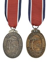 South Africa: a John Chard Decoration, type III, in silver with voided acorn suspension and large