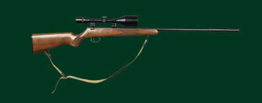 Ƒ Anschütz: a .22LR left-handed bolt action sporting rifle, serial number 1426213, threaded barrel