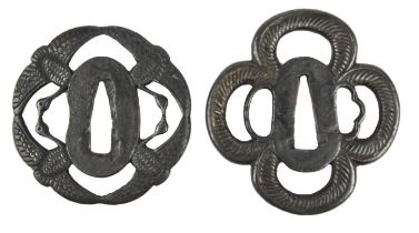 Two Japanese iron sword guards (tsuba), openwork and relief decorated, unsigned, the first maru-