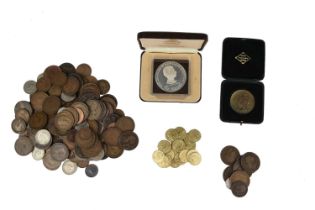 A large quantity of coins and other numismatic items: including British late pre-decimal issues,